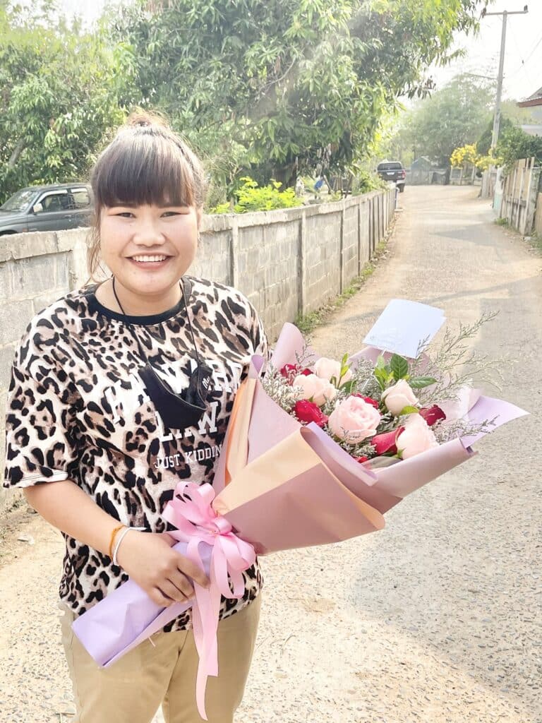 Photo of lady with flowers in Chiang Mai, Thailand