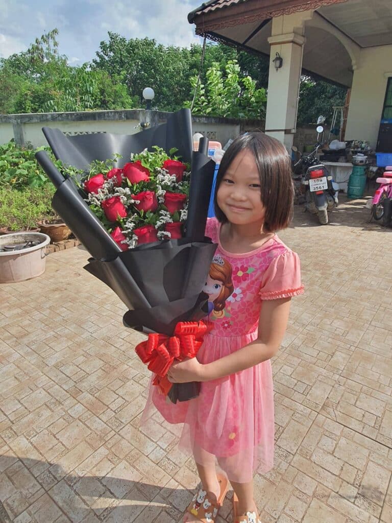 Photo of lady with flowers in Khon Kaen, Thailand